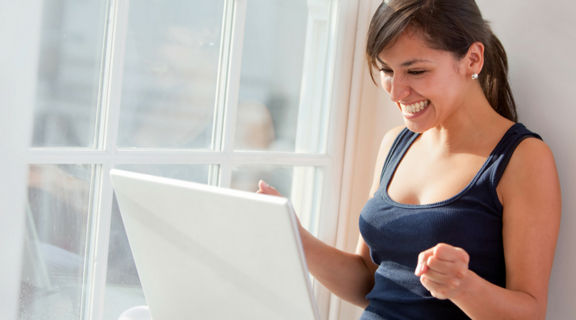 happy woman with laptop