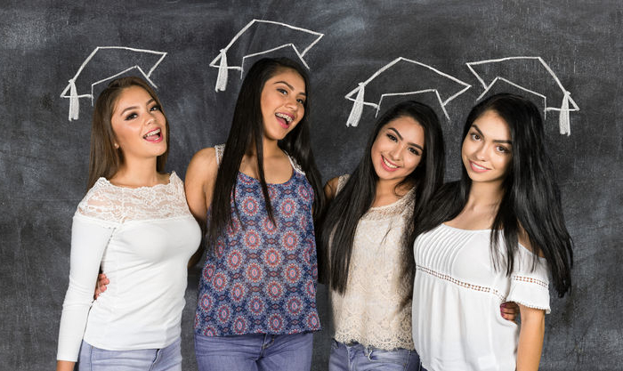 group of teen students graduating from high school the concept for Scholarships for Middle School Students